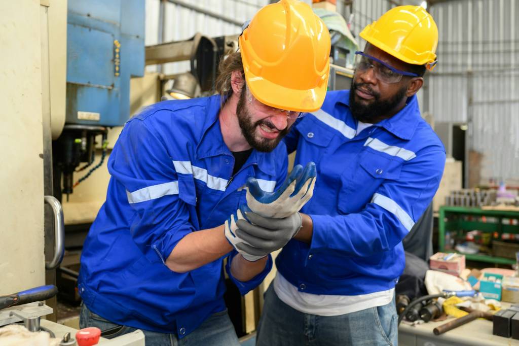 Engineer worker with accident at factory